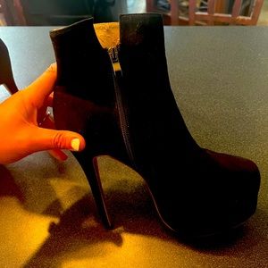 Red bottom heels, size 42, leather inside is flaky. Black suede